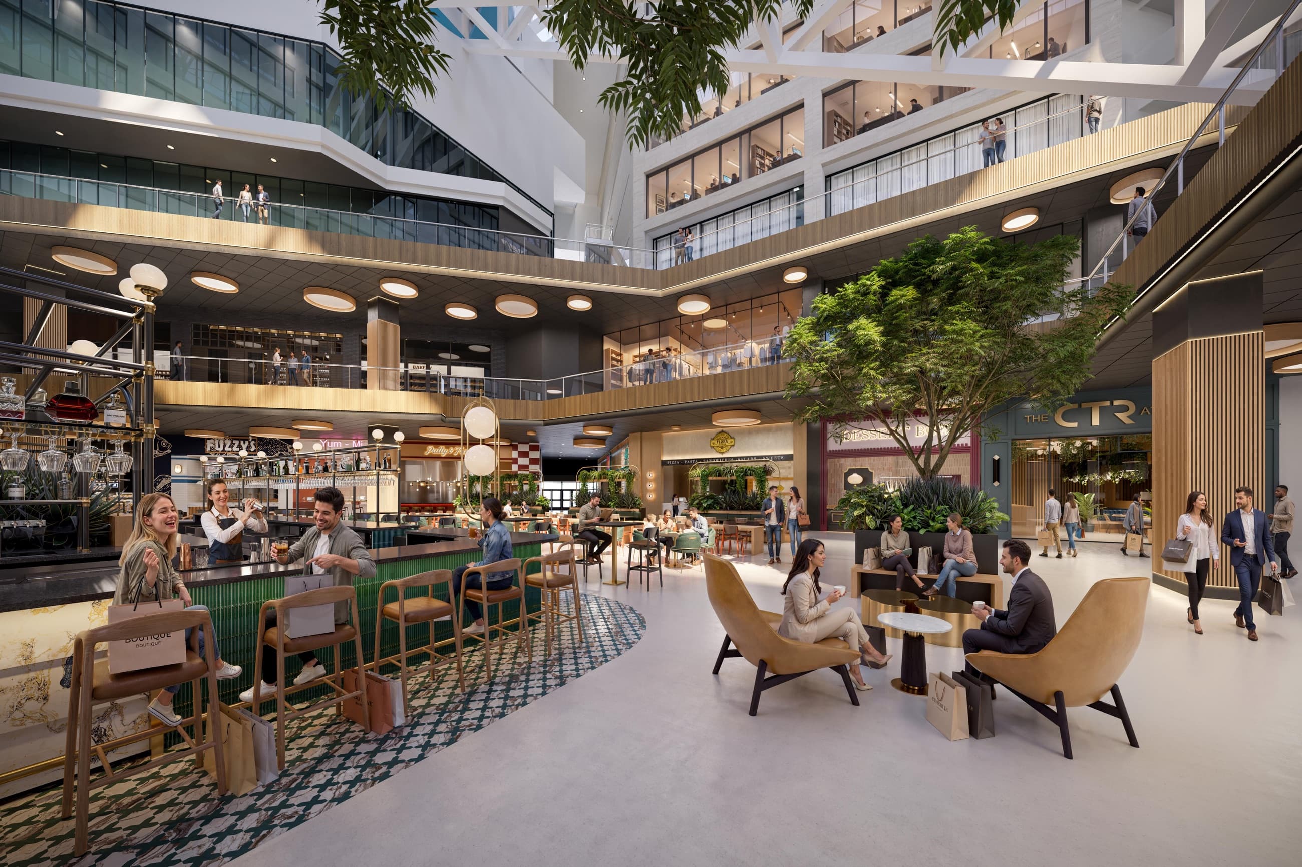 A multi-level mixed-use atrium designed for work, dining, and gathering