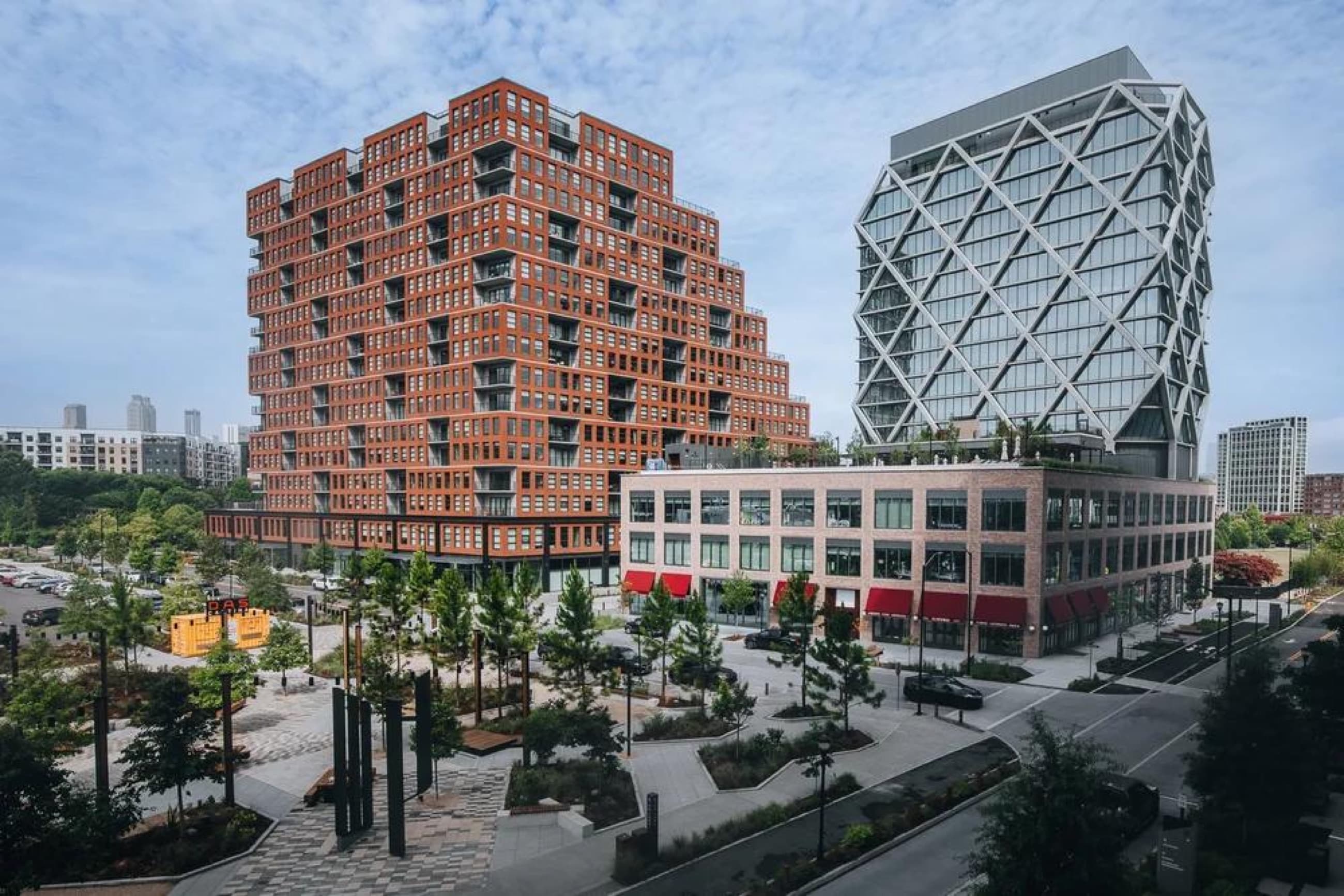 A contemporary mixed-use district with a public plaza